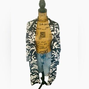 Black and white Duster. New with no tags. Never Worn